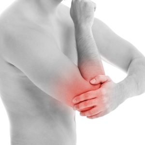 Man is touching his back because it aches